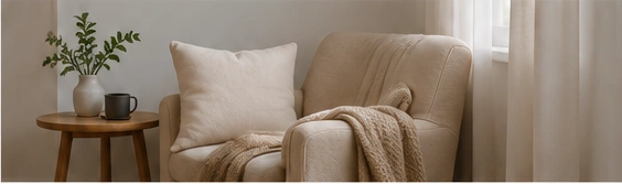 A quiet comfortable chair beside a small table